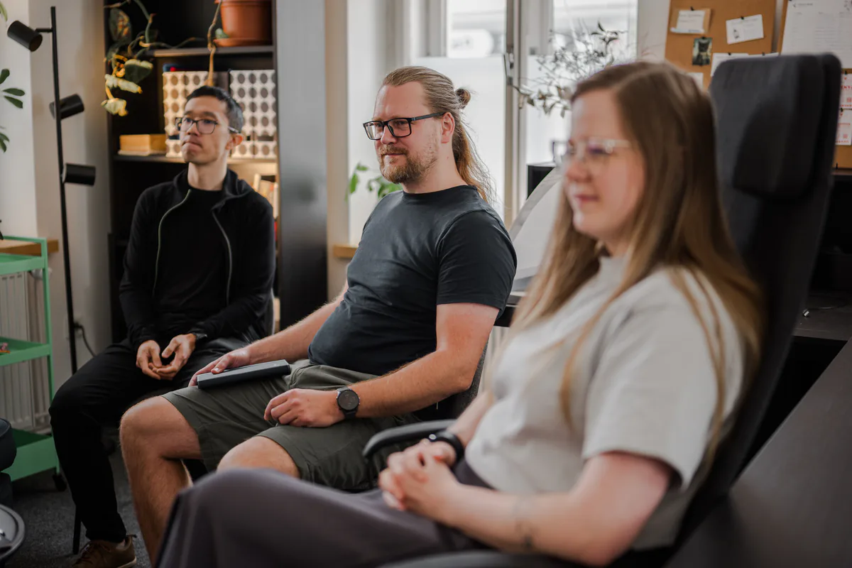 Trinera colleagues at a team meeting