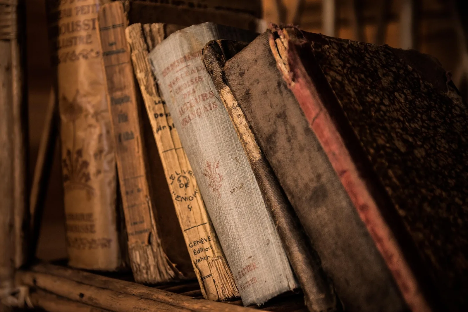 Old books stacked on top of each other